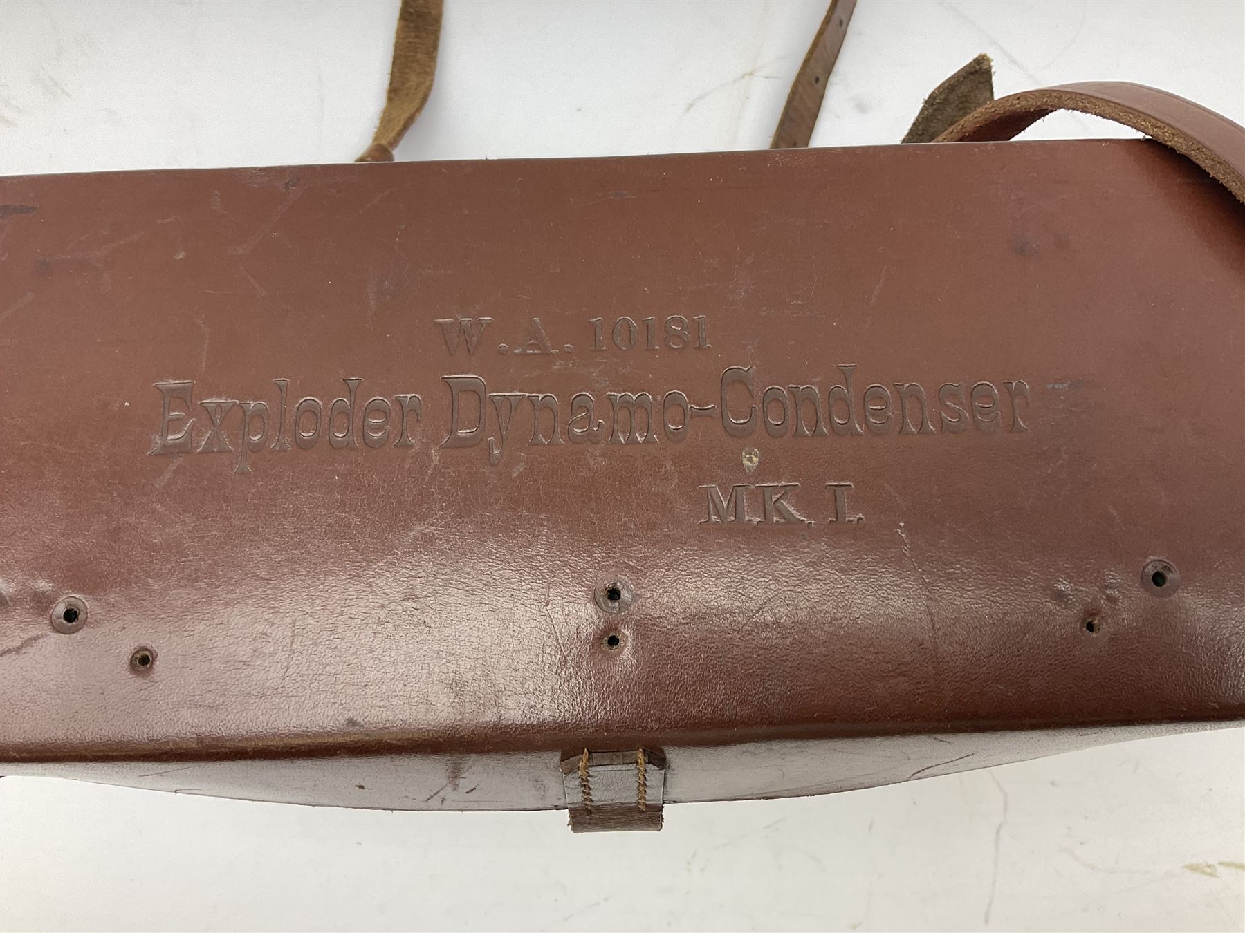 Post-WW2 stitched leather carrying case for an Exploder Dynamo-Condenser Mk.1 with baize lined fitted interior and carrying strap dated 1956 L28cm
