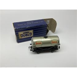 Hornby Dublo - twenty wagons including Cattle Truck; Low-Sided Wagons; Cable Drum Wagon; Tank Wagons for Shell Lubricating Oil, Esso, Vacuum and Mobil; Mineral Wagon; 20-Ton Bulk Grain Wagon; Goods Brake Van; Sand Wagon; Ventilated Vans; Bogie Bolster Wagon; High Capacity Wagon etc; all in blue striped boxes (20)