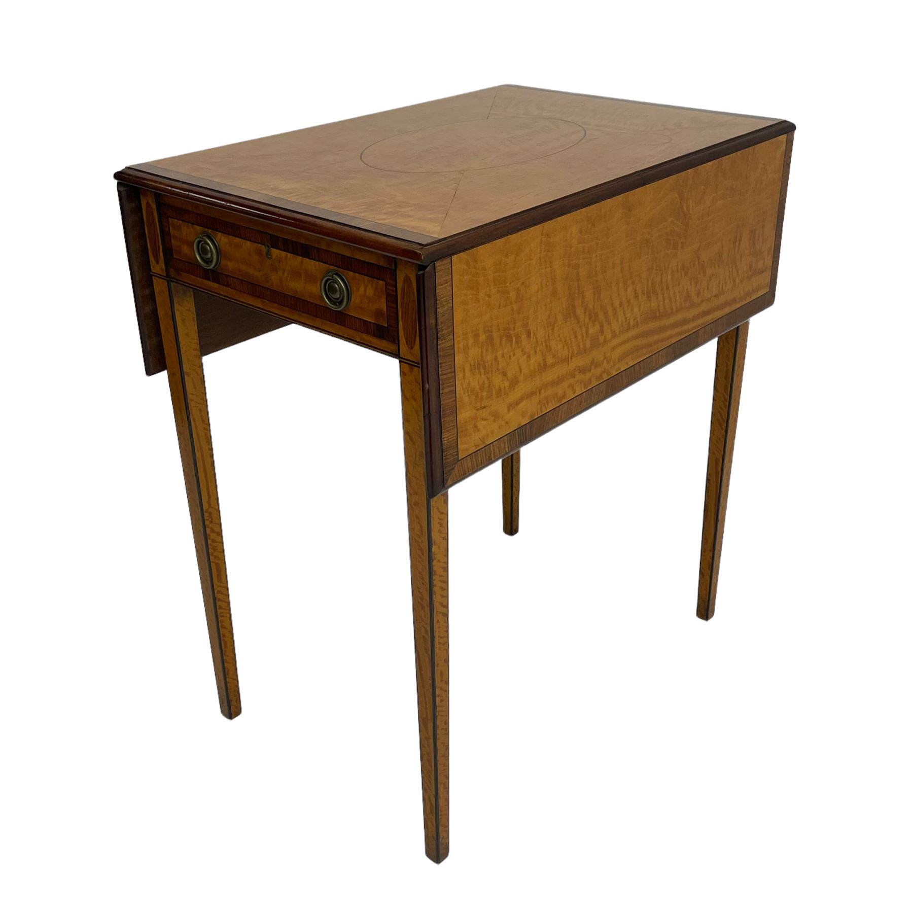 Mid-to-late 20th century Sheraton style satinwood Pembroke table, the drop leaf top with segmented veneers and central oval panel with ebony stringing, crossbanded in rosewood and with edge moulding, single short drawer to one end and faux drawer to other, square tapering supports