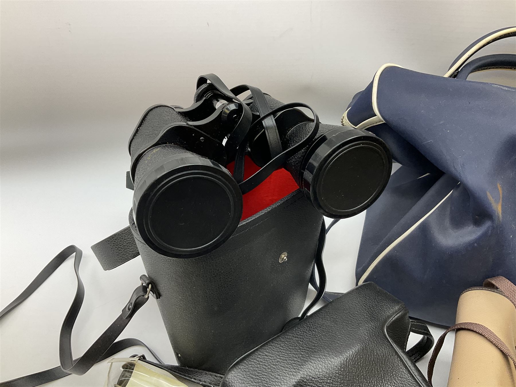 Quantity of Cameras , Lenses and Table Top Viewer- To be assessed 
Collection of cameras, lenses and photography equipment, to include Praktica EE2, Kowa SE, Kodak 66 model II, Inovar, lens Carl Zeiss Jena DDR Flektogon 2.4/35, lens Pentacon Electric f/2.8 135mm, Sunpak auto 2020, tripod  etc, together with a pair of Mark Scheffel 10x50 field binoculars.  