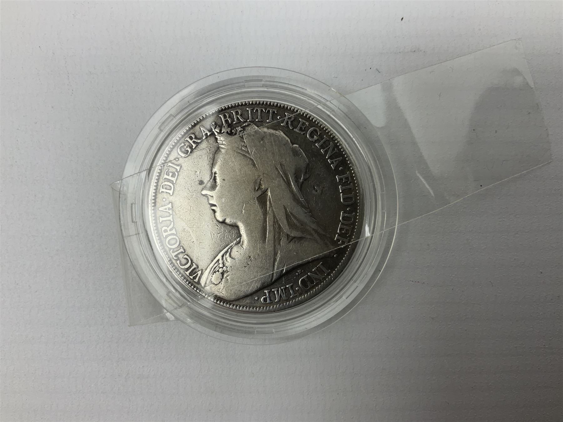 Charles I 1625 hammered silver sixpence, Queen Victoria 1894 crown coin and a cased hallmarked silver medal for the Hull photographic society, engraved '1940' 'Leonard Vokes', all housed in a red Pobjoy Mint coin box