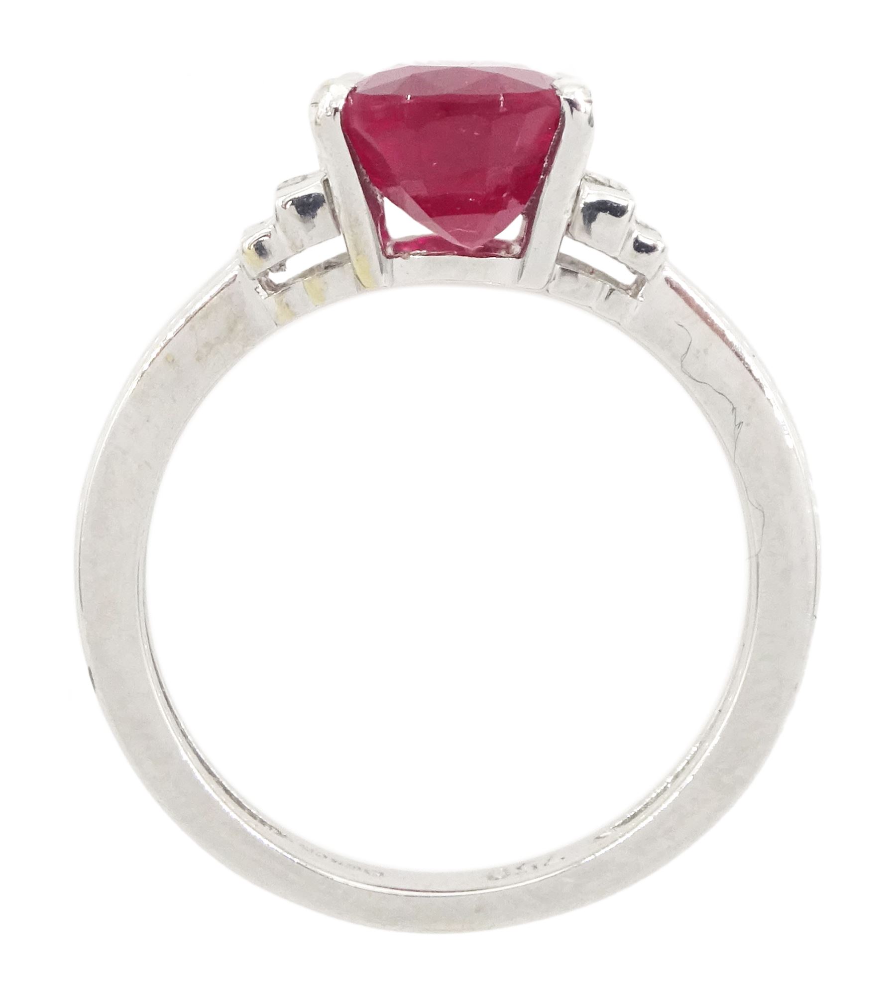 18ct white gold oval cut ruby and four stone baguette cut diamond ring, hallmarked, ruby approx 3.00 carat