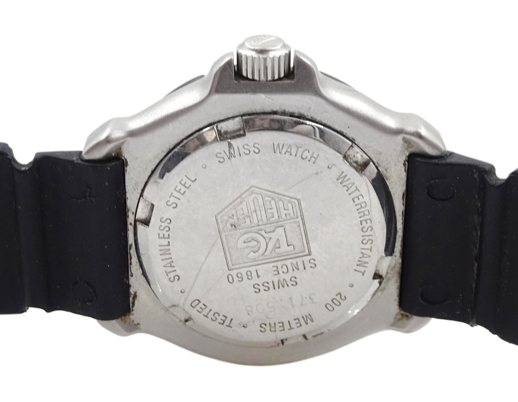 Tag Heruer Formula 1 ladies stainless steel wristwatch, model No. 371.508, luminous dial with date aperture, on original rubber strap