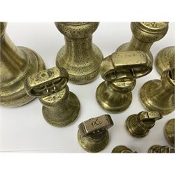 Set of seventeen Victorian brass bell weights