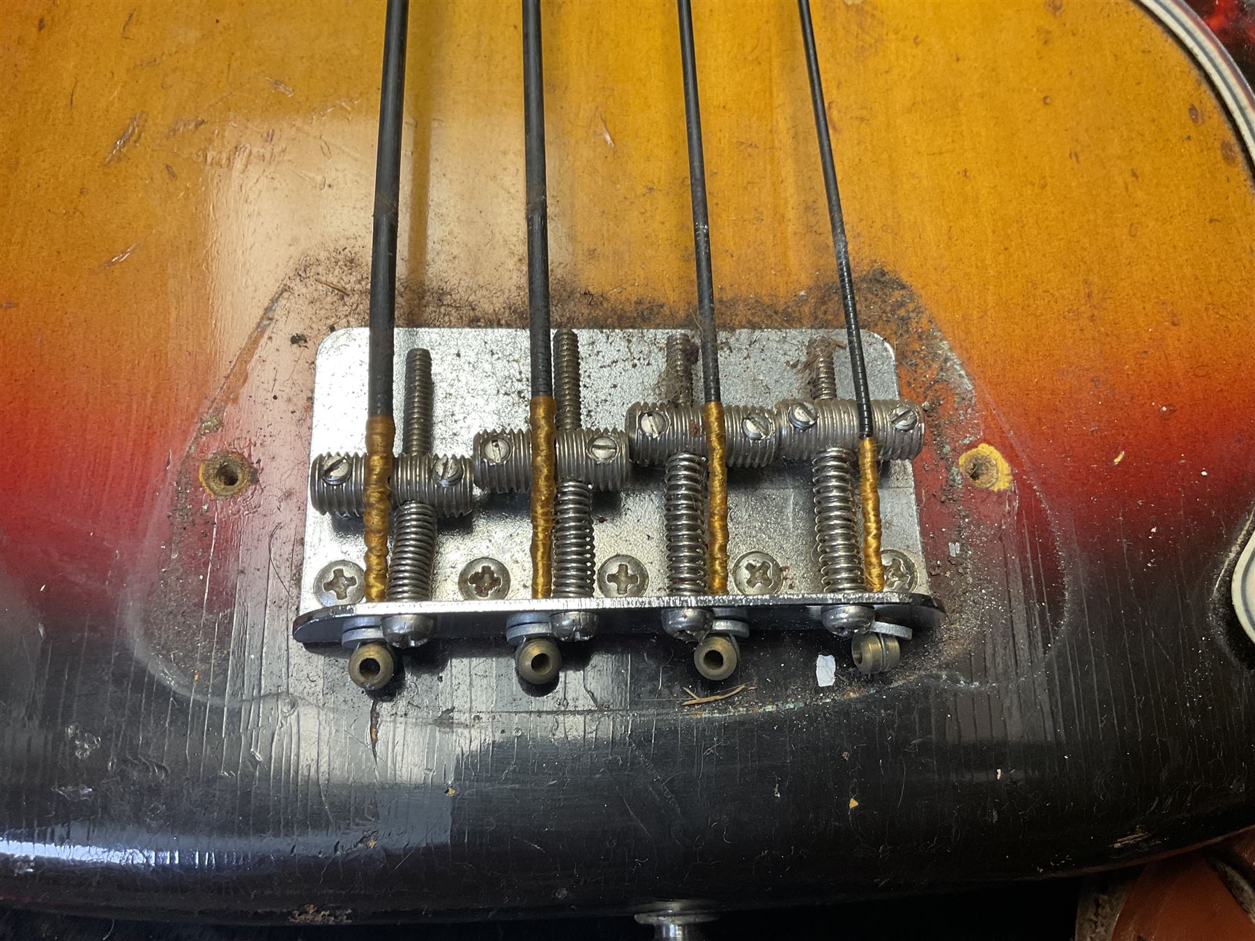 Early 1960s American Fender Precision electric bass guitar with original three-tone sunburst finish and faux tortoiseshell scratch plate; rosewood fretboard; all original fittings including chromium plated bridge and pick-up covers, finger rest, 'pots' and machines, dated on end of neck 5NOV62C, serial no.91625; L115cm overall; in Selmer simulated reptile skin covered carrying case. Sold with non-transferrable CITES A10 licence, certificate no.23GBA10CNKKEB, serial no.441200, dated 30th August 2023. Also included are original 1960s photographs of the band 'The Rascals' and photocopies of newspaper cuttings advertising their forthcoming performances along with a photocopy of a photograph of their television appearance on 'Opportunity Knocks' in 1967/8 (coming second to Mary Hopkins). In addition there is a reel-to-reel tape recording and USB stick of the band playing and two sheets of biographical information. Auctioneer's Note: The guitar was ordered by Trevor Parker from Pat Cornell's Music Shop, Spring Bank, Hull and imported from the USA in 1962, well before it was available in the UK. Trevor was the bass guitarist of The Rascals from Hull, later The Ides of March, who supported artists such as Elton John on the Hull circuit. Trevor played the guitar extensively until 1969 when The Rascals disbanded, he got married to Maureen and settled down to family life. Trevor sadly passed away in 2017, and after being in store for fifty-four years his widow has decided it is time for his guitar to be sold.