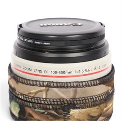 Canon EF 100-400mm f/4.5-5.6L Image Stabilising Ultrasonic camera lens serial no. 4710001538, with camouflage cover and lens case, boxed with instructions
