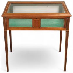 Edwardian satinwood and inlaid bijouterie table, rectangular hinged glazed top above a baize-lined interior, frieze with panelled inlay detail, raised on square tapered legs with boxwood and ebony stringing