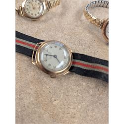 Two ladies 9ct gold cased manual wind wrist watches, both on expanding base metal straps, together with a gentlemans 9ct gold cased wristwatch on canvas strap