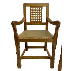 'Rabbitman' set of eight oak dining chairs, pierced lattice backs, upholstered seats with studwork band, octagonal front supports joined by stretchers, carved with rabbit signature, two carvers and six side chairs, by Peter Heap of Wetwang
