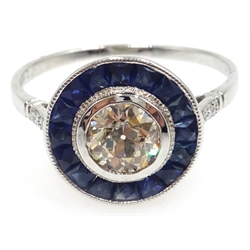  18ct white gold (tested) Art Deco style sapphire and diamond circular ring, central diamond 0.69 carat  