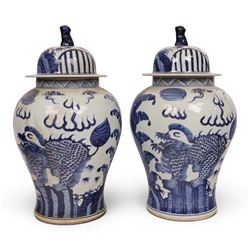 Pair of blue and white Chinese vase and cover, of baluster form, decorated with dragons, t...