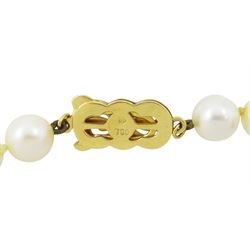 Mikimoto single strand cultured white pearl necklace, with 18ct gold clasp, stamped 750, boxed with certificate dated 1983