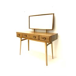 Ercol dressing table with raised back mirror, fitted with one long and two short drawers, raised on tapering supports 