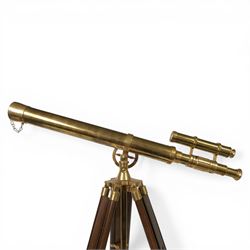 Reproduction brass marine telescope, on wooden tripod stand, inscribed Marine Telescope, London 1915, height on stand H95cm