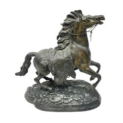Bronzed figure of a galloping horse, upon a naturalistic base, H35cm