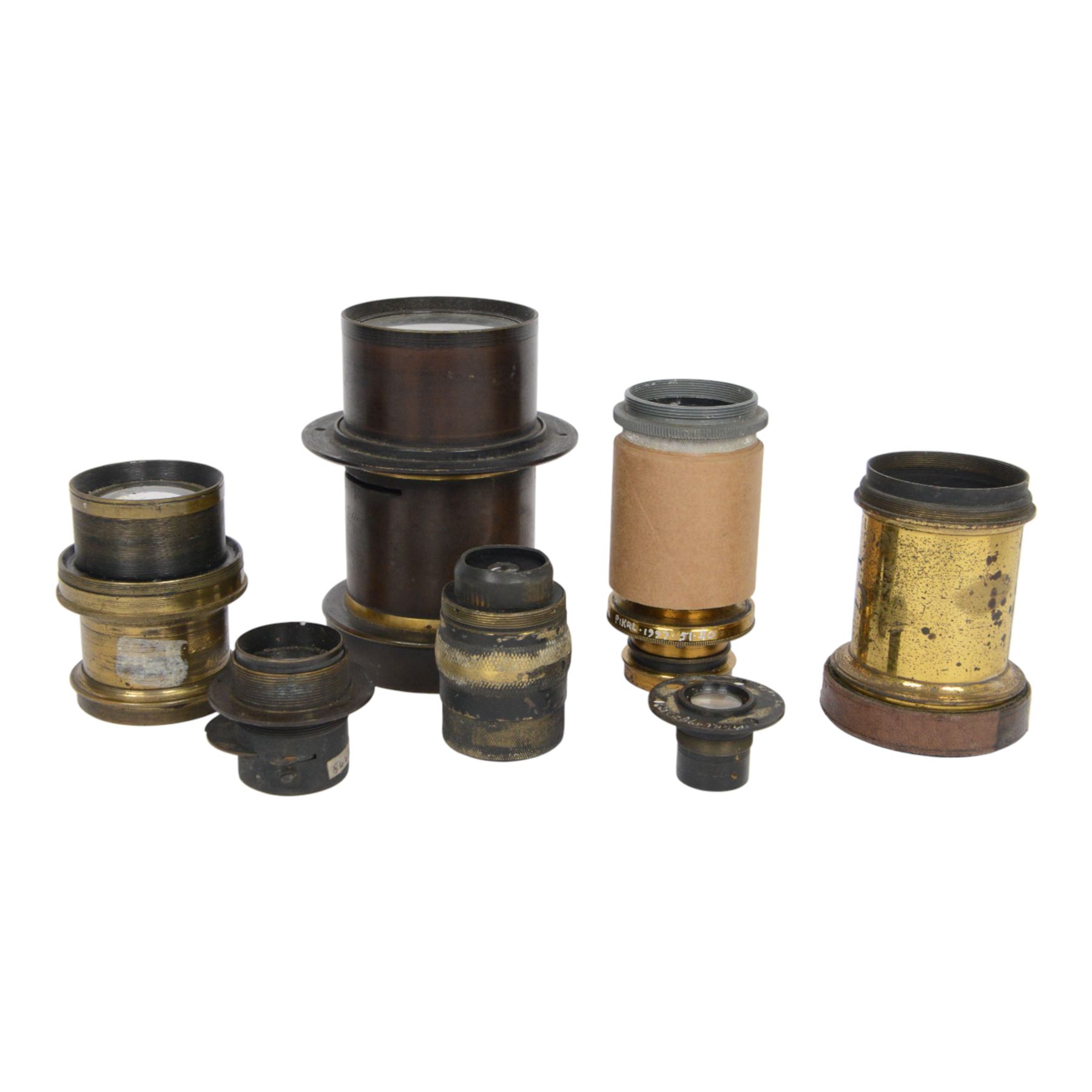 Seven 19th century and later brass camera lenses, including J. Lancaster & Son Rectigraph lens, Watson & Sons 8 1/2 x 6 1/2 lens, Dallmeyer lens and Wray London 5 x 4 lens