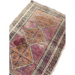 Small Persian rug, decorated with three stepped lozenge medallions (140cm x 91cm), and another Persian red ground rug (147cm x 104cm)