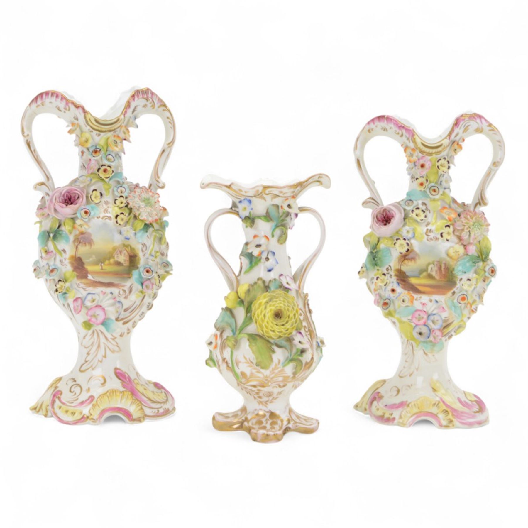 Near pair of Coalbrookdale style vases, of urnular twin handled form, painted with landscape scene and encrusted with blossoming flowers, tallest H29.5cm, together with a smaller Coalbrookdale style twin handled vase profusely encrusted with blossoming flowers, H22cm