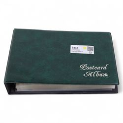 Collection of Scarborough postcards, mostly black and white examples, in postcard album