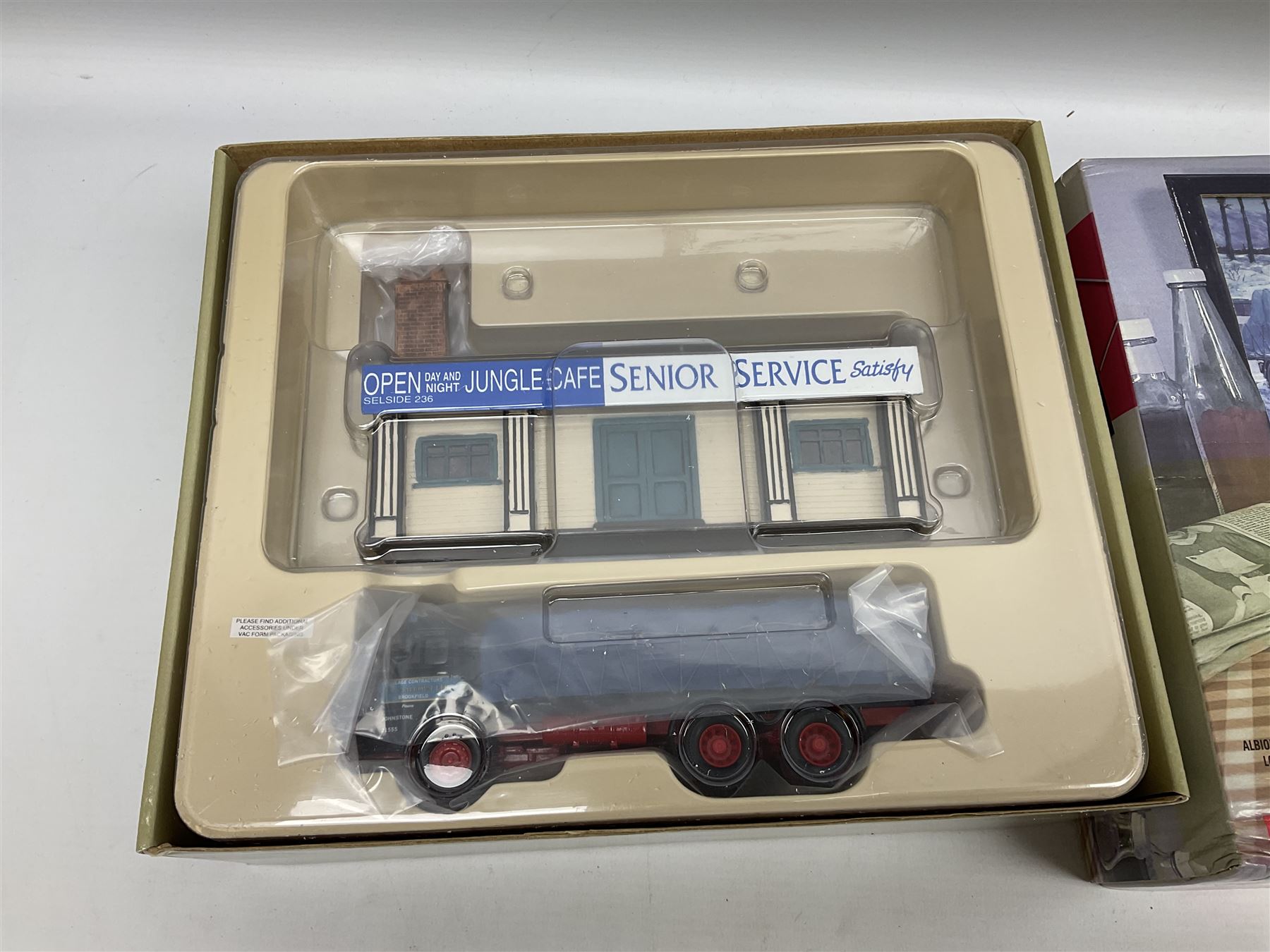 Corgi - limited edition Cafe Connection Albion Reiver Sheeted Platform lorry W.H. Malcolm Ltd Jungle Cafe No.CC11603; and seven Hauliers of Renown Modeller Series vehicles CC19910, 19911, 19912, 19913, 14100, 14000 & 13700 all boxed; together with two Modeller Accessory packs (10)