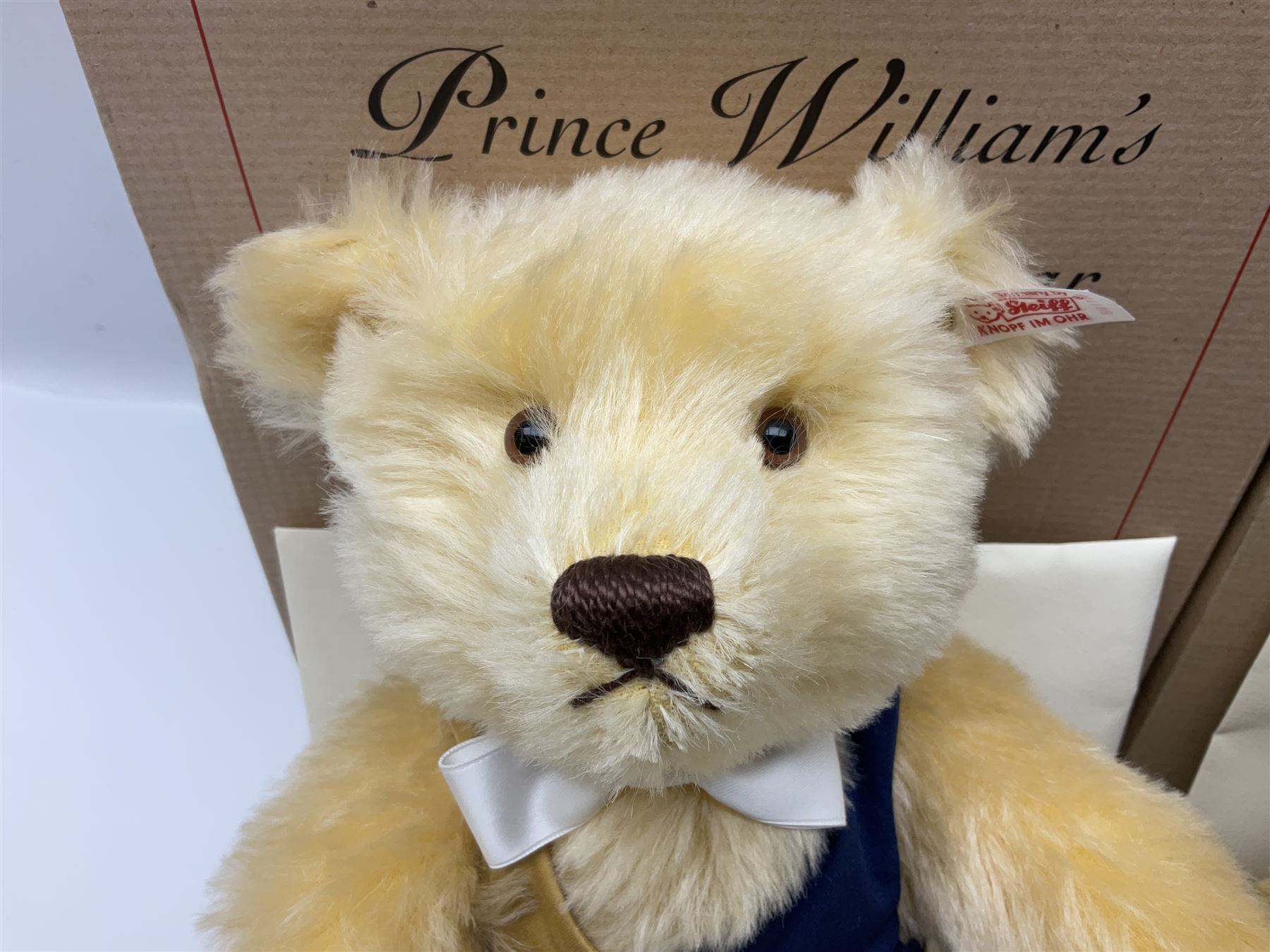 Two modern Steiff limited edition teddy bears - Prince William's 21st Birthday Bear with growler mechanism No.58/1500 H35cm; and Cherished Teddies Collection Daisy No.4269/5000 H33cm; both boxed with certificates (2)