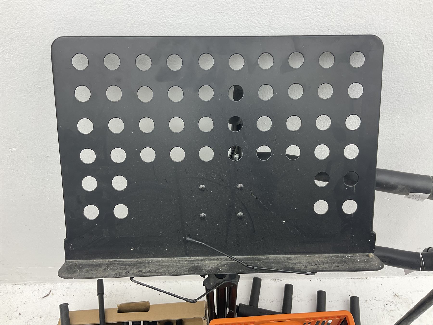 Two Shure SM58 microphones, Gatt Audio DM-700 microphone, other boxed and unboxed microphones and various microphone and music stands