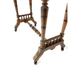 Late Victorian oak side table, moulded top, bobbin turned supports and stretcher, shaped feet and castors