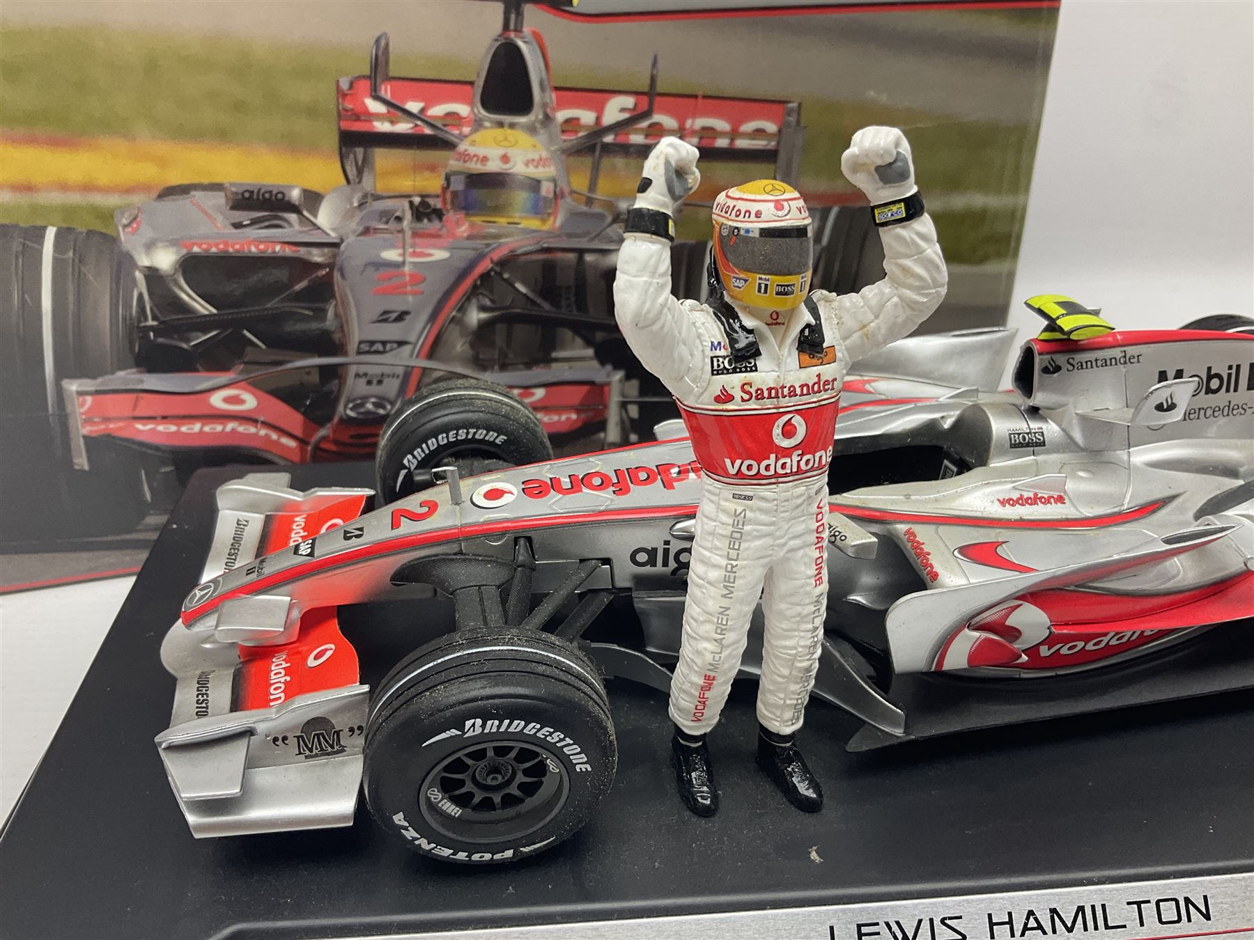 Mattel Hot Wheels 1:18 scale die-cast racing car - Vodaphone McLaren Mercedes; boxed with stand