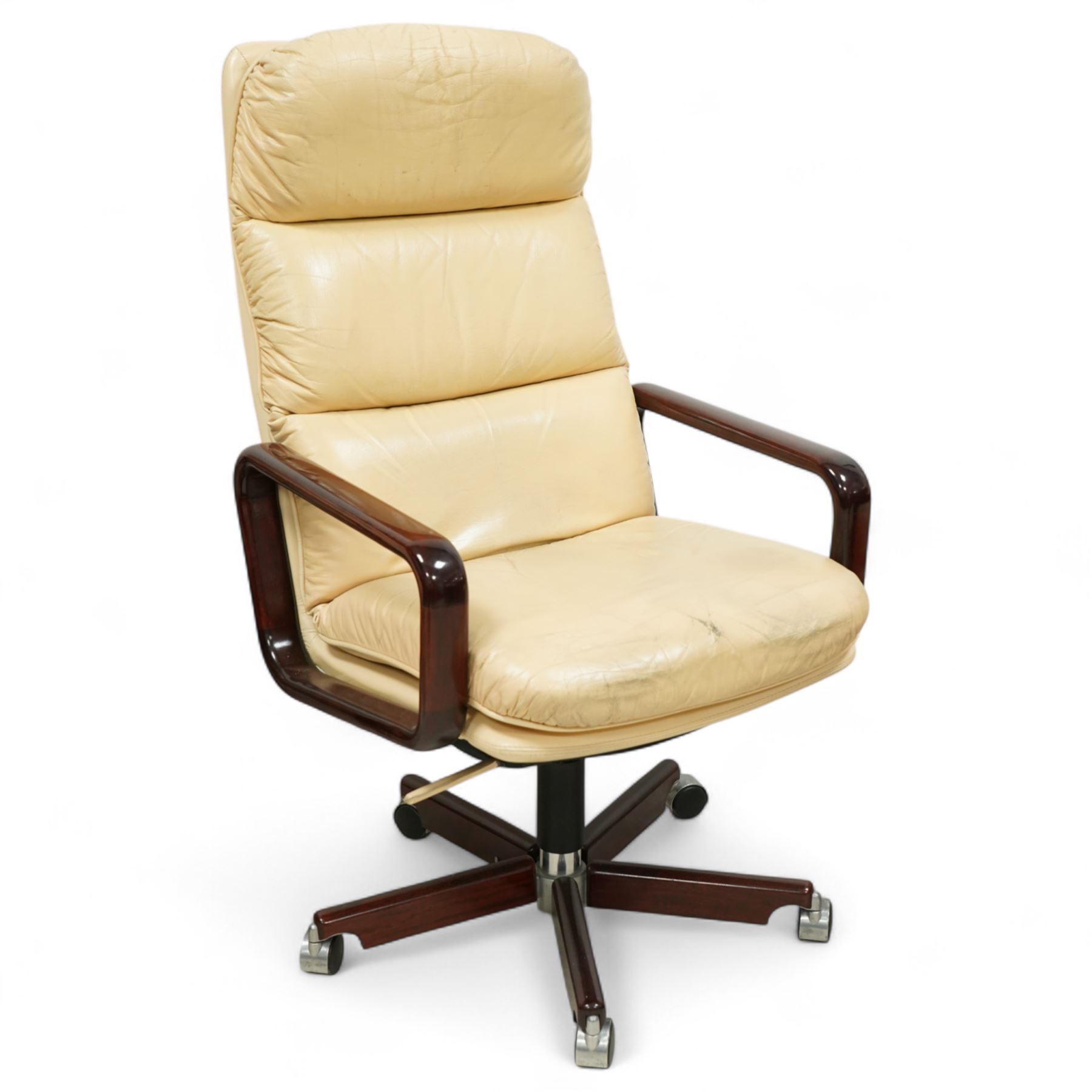 Dyrlund - contemporary pair of armchairs with solid Santos rosewood frame, rounded edges and broad armrests, seat and backrest with a removable cream leather over-stuffed cushions, together with a classic Dyrlund office chair with teak swivel base and cream leather upholstery, 62x44x109cm, (3)


Note: Dyrlund is a Danish furniture manufacturer known for its high-quality, handcrafted pieces, particularly in the mid-century modern style. Founded in 1960 by Frits Hjerte Dyrlund in Rude, Denmark, the company has remained a family business, now run by the second and third generations. Dyrlund specializes in both home and executive office furniture, focusing on practicality, solid construction, and classic design. 
