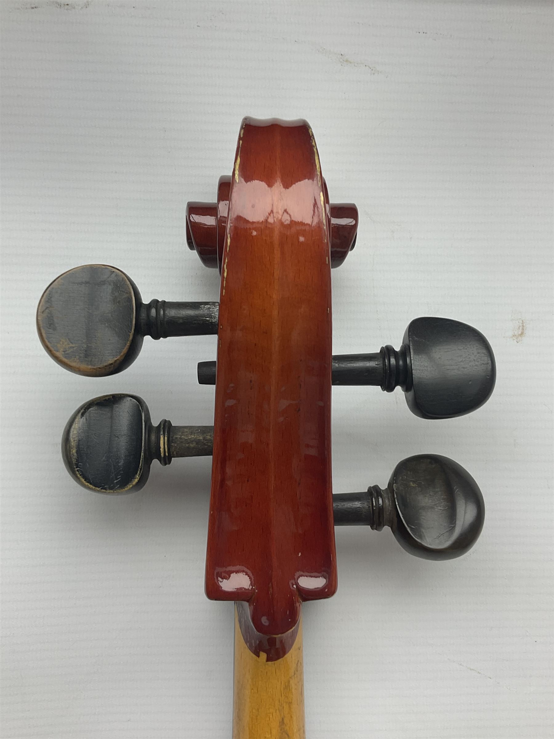 Two student half-size cellos - Boosey & Hawkes Artia with 65cm one-piece back and spruce top; bears maker's label; L104cm overall; and Romanian with 65.5cm two-piece maple back and ribs and spruce top; bears label; L108.5cm overall; each in soft carrying case with two bows (2)