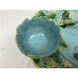 George Jones style Majolica strawberry set, comprising of a dish, serving spoon, sugar bowl and cream jug, decorated with strawberry plants on blue ground, impressed mark beneath, L37cm 