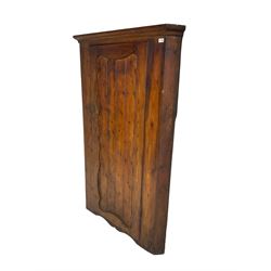 Late 19th century pine corner cabinet with shaped panelled door 