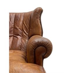 Tetrad - 'Blake' club armchair, fanned wingback and rolled arms upholstered in tan brown leather, on ball and claw carved cabriole feet 