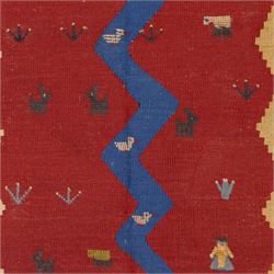 South West Persian Qashqai pictorial flatweave kilim, with central sinuous indigo river band dividing broad panels of madder red and camel yellow, red ground sparsely decorated with stylized animals, birds, and schematic shrubs, executed in bold geometric idiom, with fringe ends 