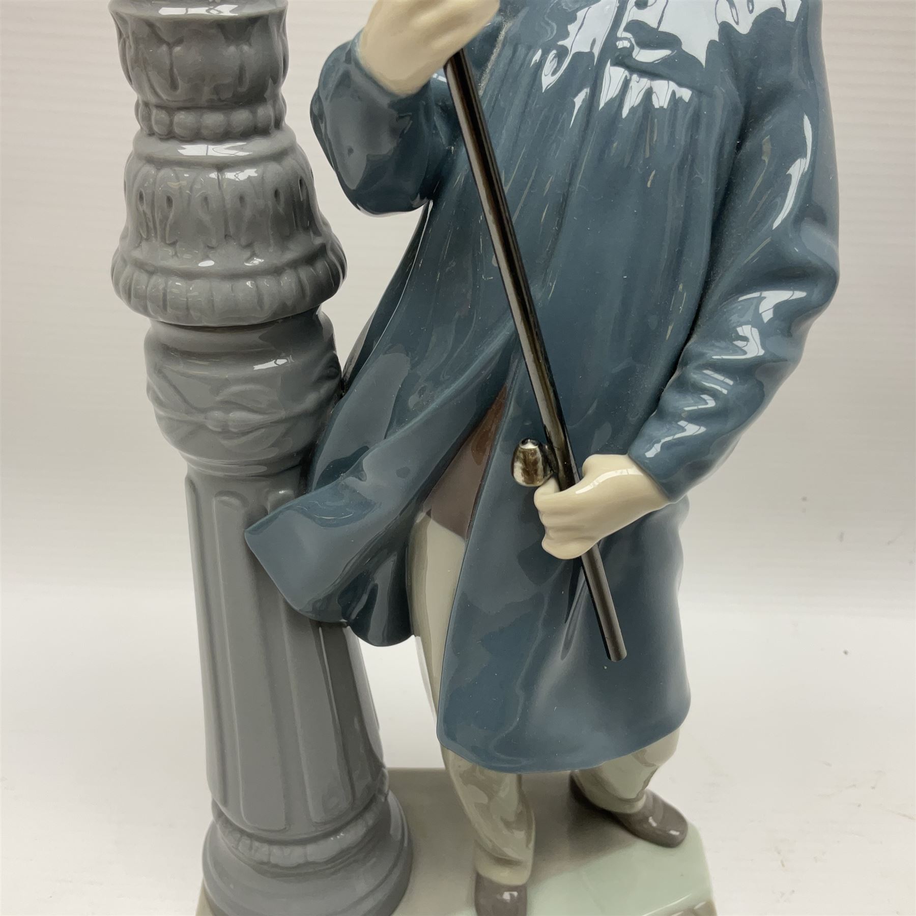 Five Lladro figures, including The Lamp Lighter no 5205,  Girl and Kittens no 6102, Cat no 5113 etc