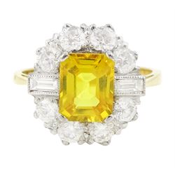 18ct gold yellow sapphire and diamond cluster ring, single octagonal cut yellow sapphire of approx 2.15 carat, surrounded by eight brilliant cut diamonds and two baguette cut diamonds within a milgrain setting, stamped, total diamond weight 1.2 carat