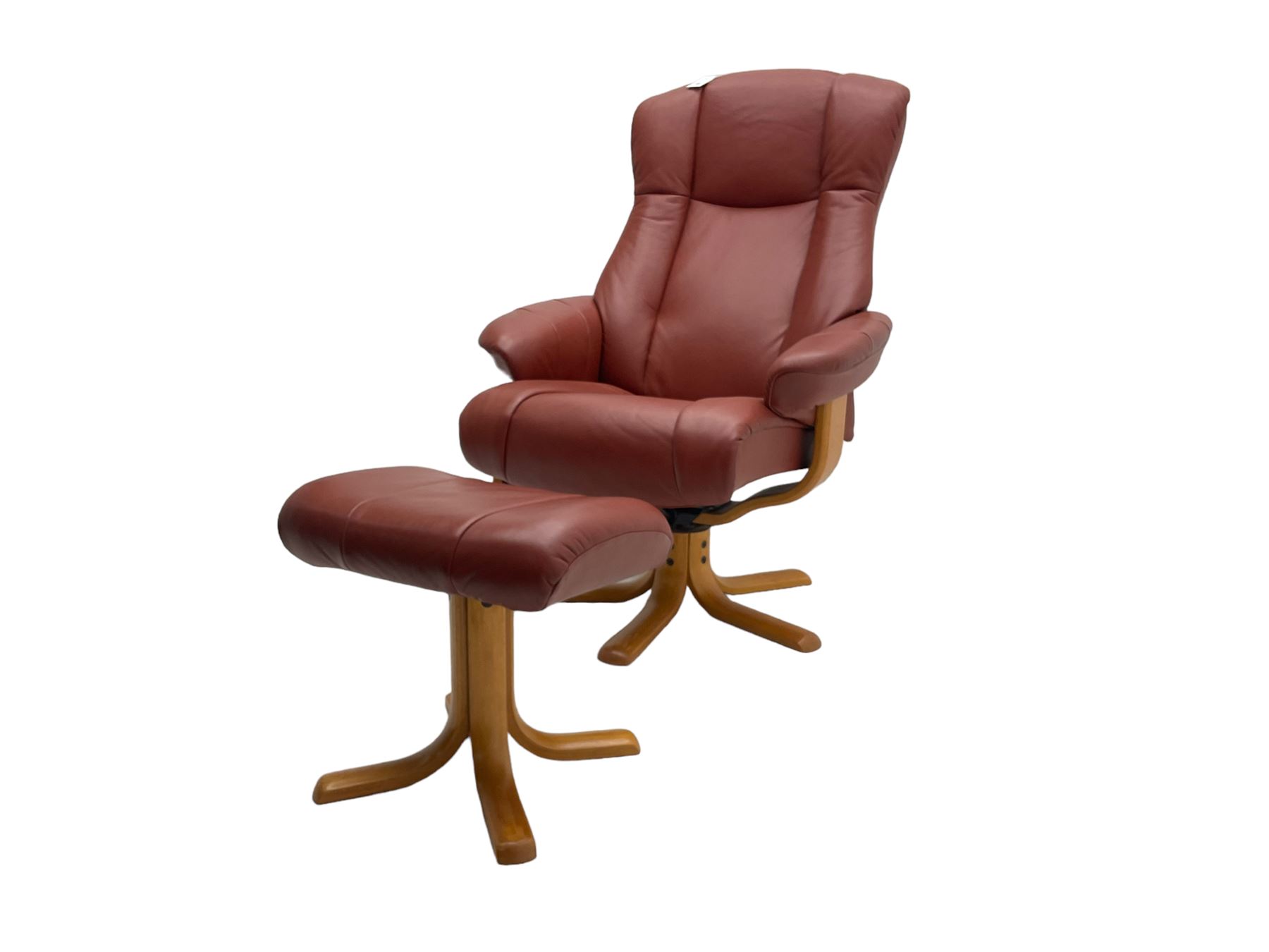 Mid-20th century design reclining armchair with swivel action, upholstered in red leather, raised on U-shaped supports with quadruform base, with matching footstool