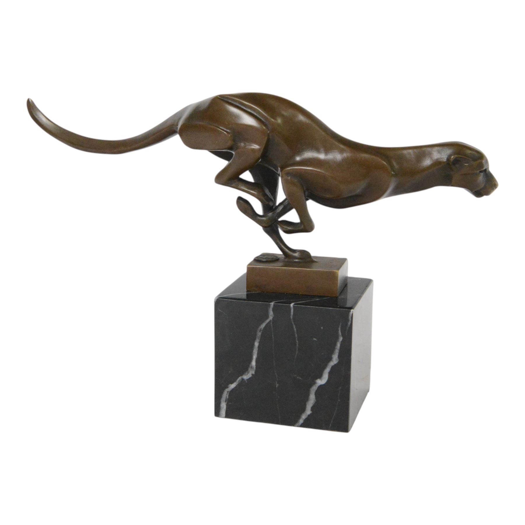 Bronze figure, modelled as a running cheetah, with foundry mark, raised upon a marble base, H20cm