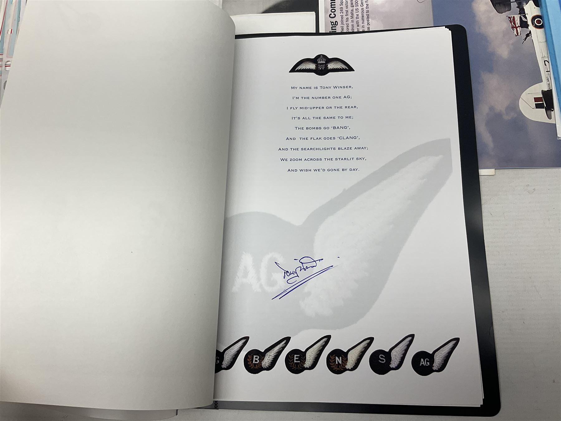 76 Squadron - small archive of photographs, signatures etc; signed copy of Conversations with a Rear gunner by Tony Winser; and collection of signatures of WW2 pilots and aircrew, some original but most facsimile/copies, including Lt. Col. W.A. Bishop VC, DSO, MC, DFC, Johnnie Johnson, Bomber Command etc