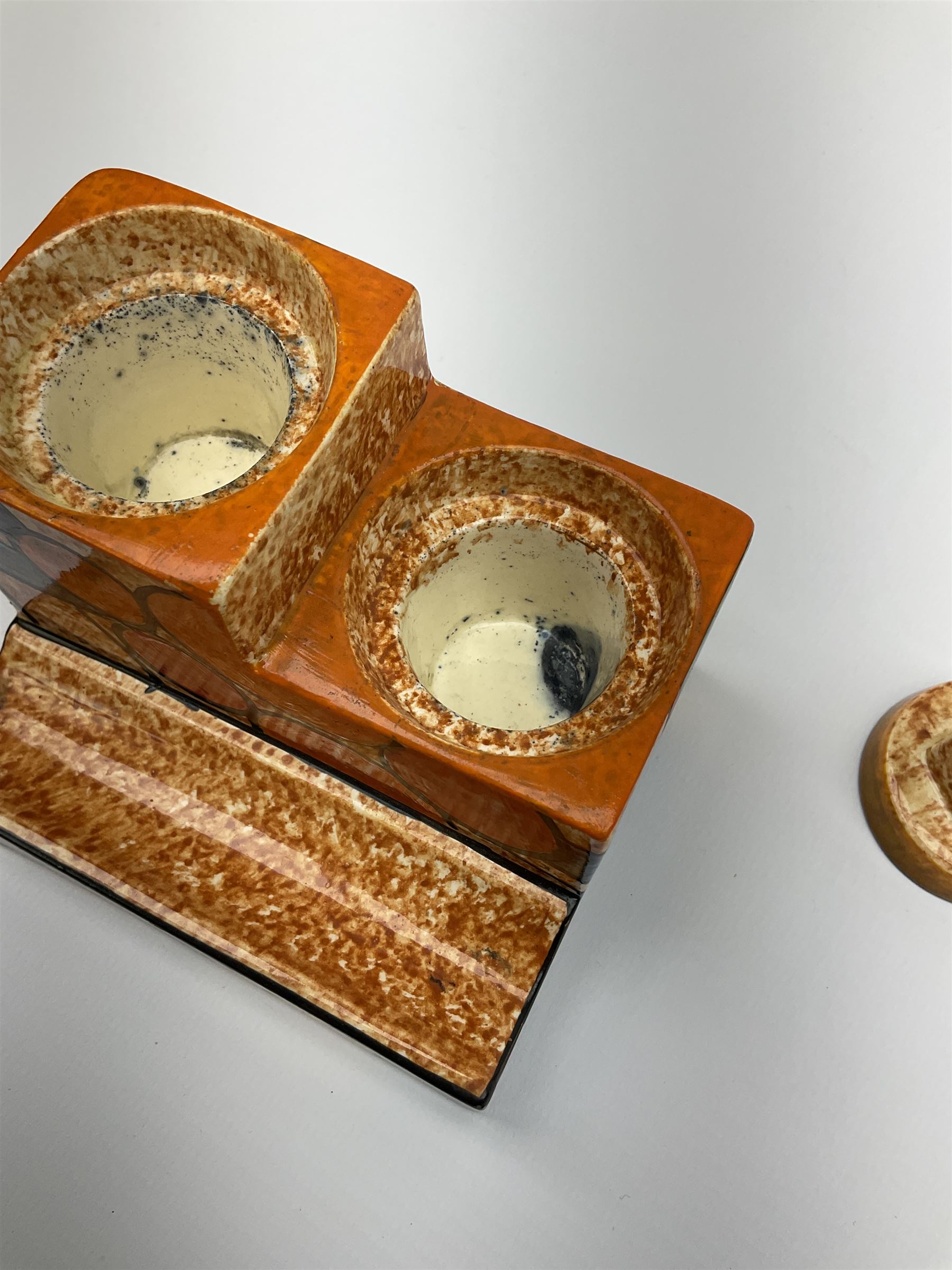 A Clarice Cliff Bizarre Cafe au lait double cube inkwell with pen tray, decorated in the Berries pattern, with printed mark to base, and shape number 462, H7cm W10cm. 