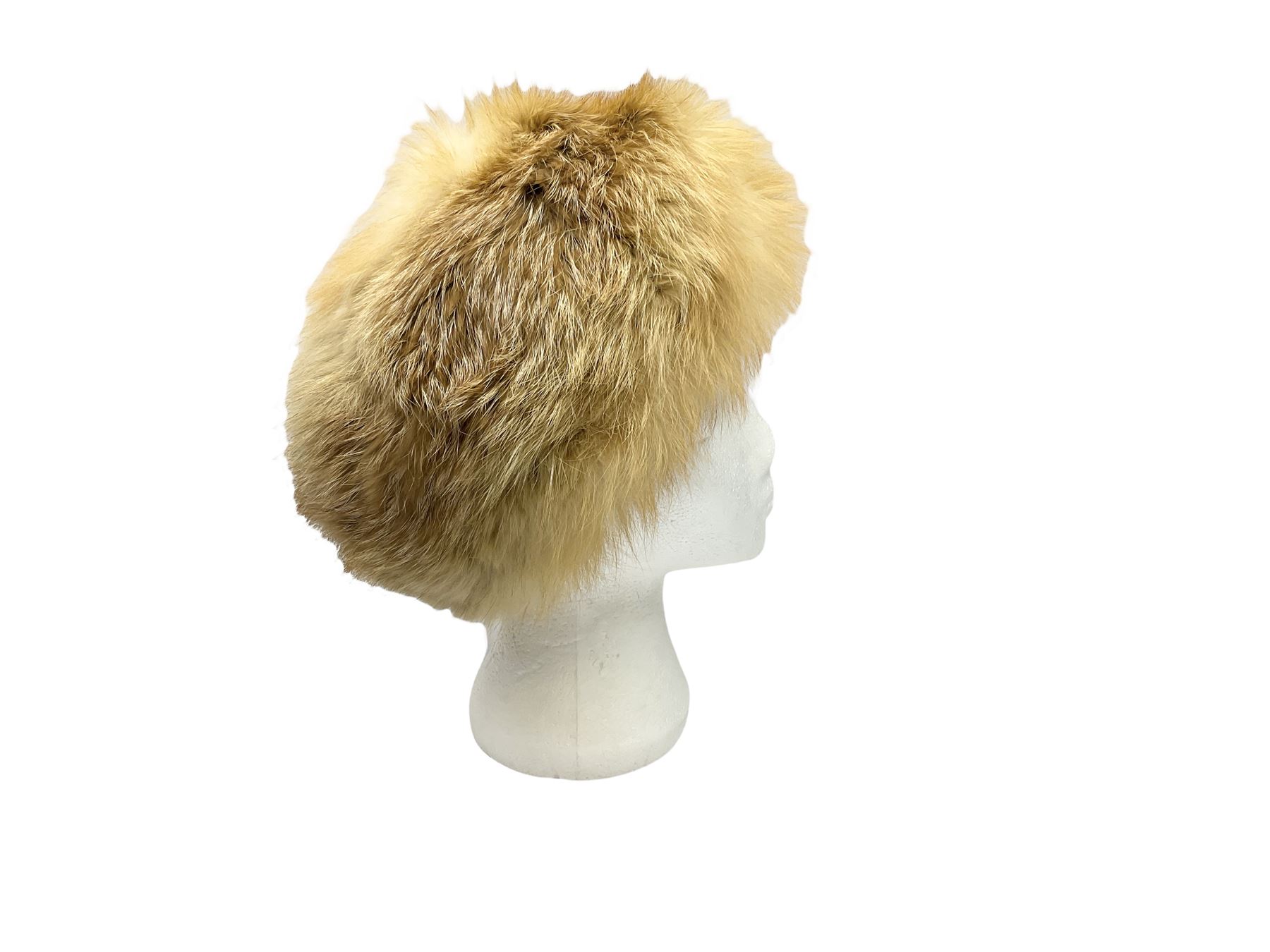 White Saga fox stole, together with Cresta Red fox fur hat, Red fox fur headband, a fur headband and matching cuffs, Harris Tweed clutch bag with fur trim, a fur clutch bag and an Ostrich feather and mohair scarf. 