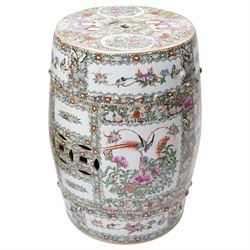 Chinese famille rose garden seat, together with a further terracotta example, H51cm and 49cm (2)