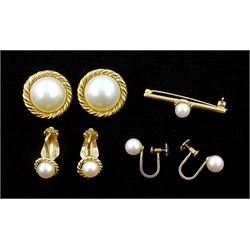 Pair of gold Mabe pearl clip earrings, two other pairs of pearl screw back and clip earrings and a pearl brooch, all 9ct stamped or tested