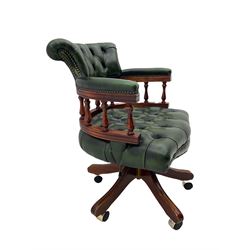 Captains swivel desk chair, upholstered in button green leather, sprung reclining action