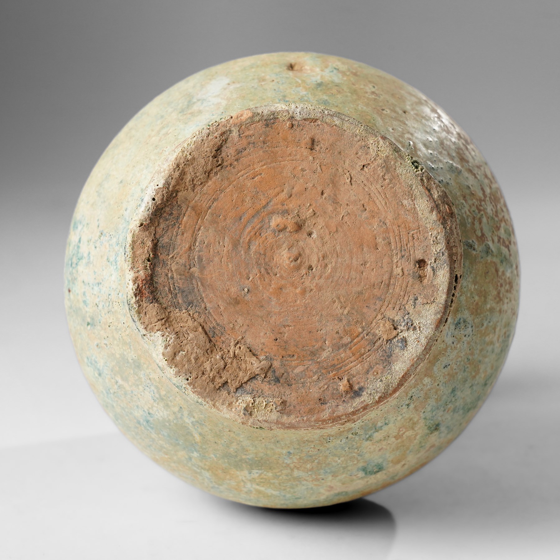 Green glazed 'Hu' jar, probably Han Dynasty, with flared rim H15.5cm 