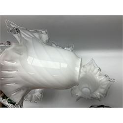 Milk glass lampshade decorated with peacocks, together with a Tiffany style lampshade, a set of five white frilled lamps shades etc 