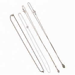 Four 9ct gold necklaces, including two stone set pendant necklaces and two chains