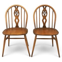 Ercol - Set of four dark elm 'Fleur De Lys' chairs