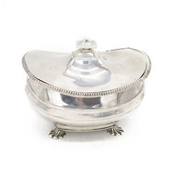 1920s silver sucrier and cover, of oval form with oblique gadrooned rim, the cover with re...