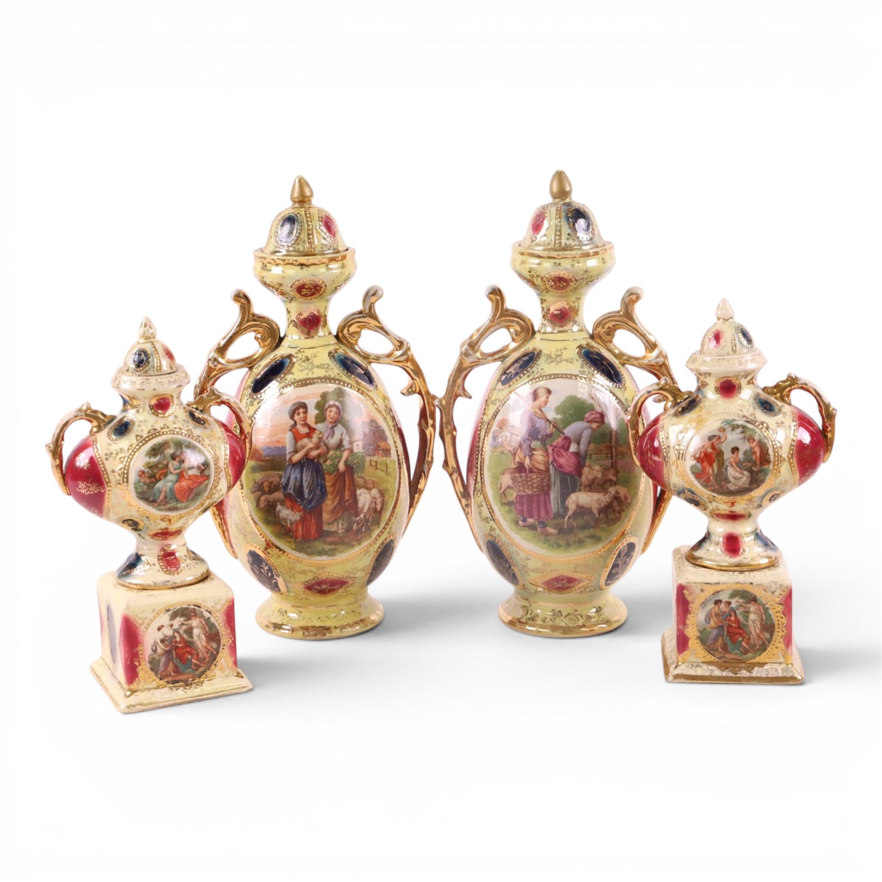 Pair of Royal Vienna twin handle vases with covers the central panel with shepherdesses together with another pair 